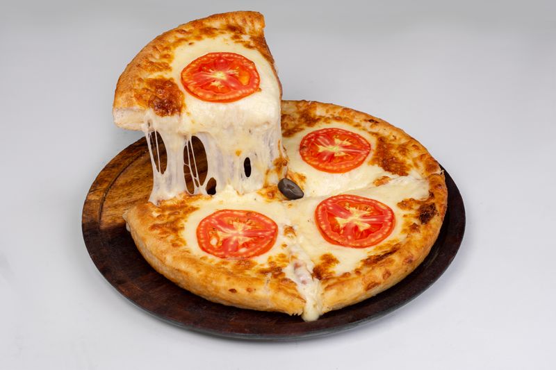Four cheese pizza with mozzarella, gorgonzola, parmesan and fontina